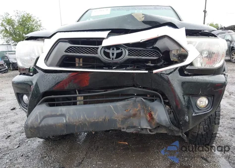 2015 Toyota Tacoma Base V6 z USA, uszkodzony, nr VIN 3TMLU4EN2FM180066